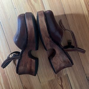 Brown wooden clogs